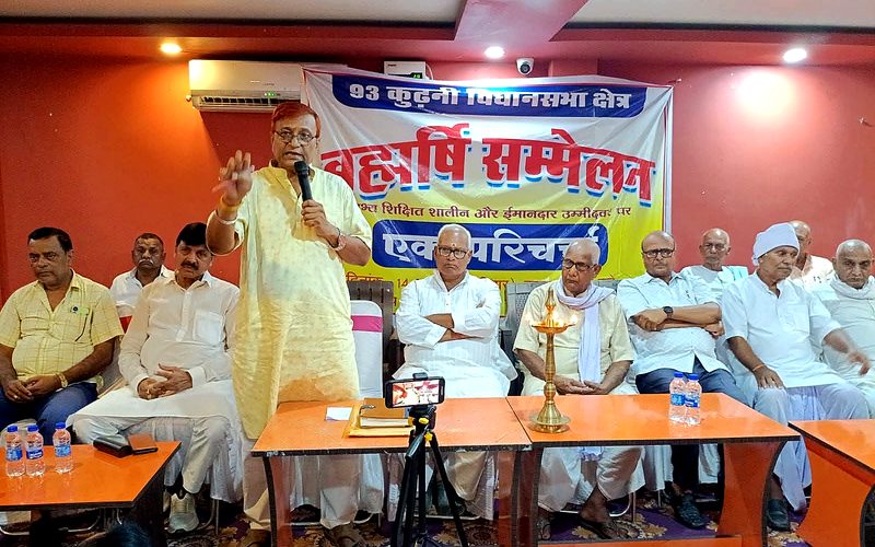 Speaker holding microphone at meeting